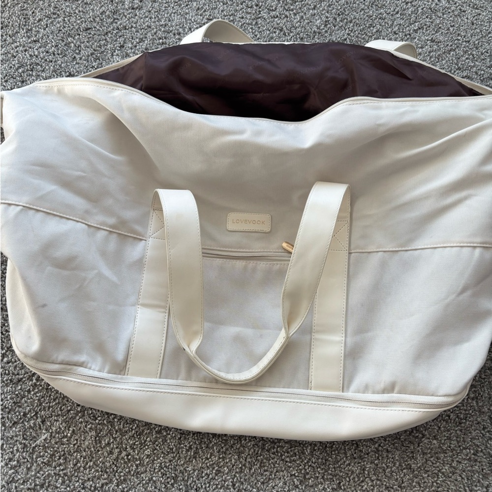 Elegant Cream Travel Bag by Lovevook